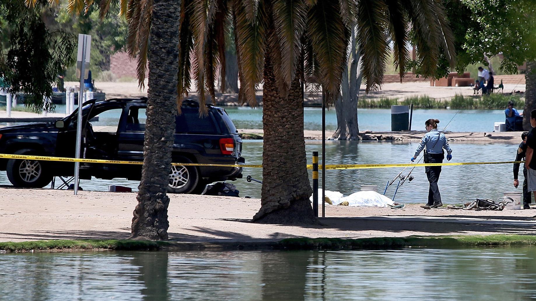 2 killed at Tucson lake when fishing buddy backs into them in SUV